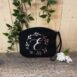 initial wrist bag black